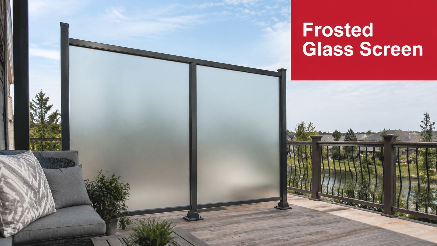 A frosted glass privacy screen installed on a wooden deck overlooking a residential lake neighbourhood area.
